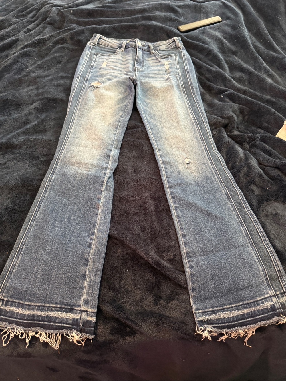 KanCan Bootcut Jeans in Faded Blue with Frayed Hem